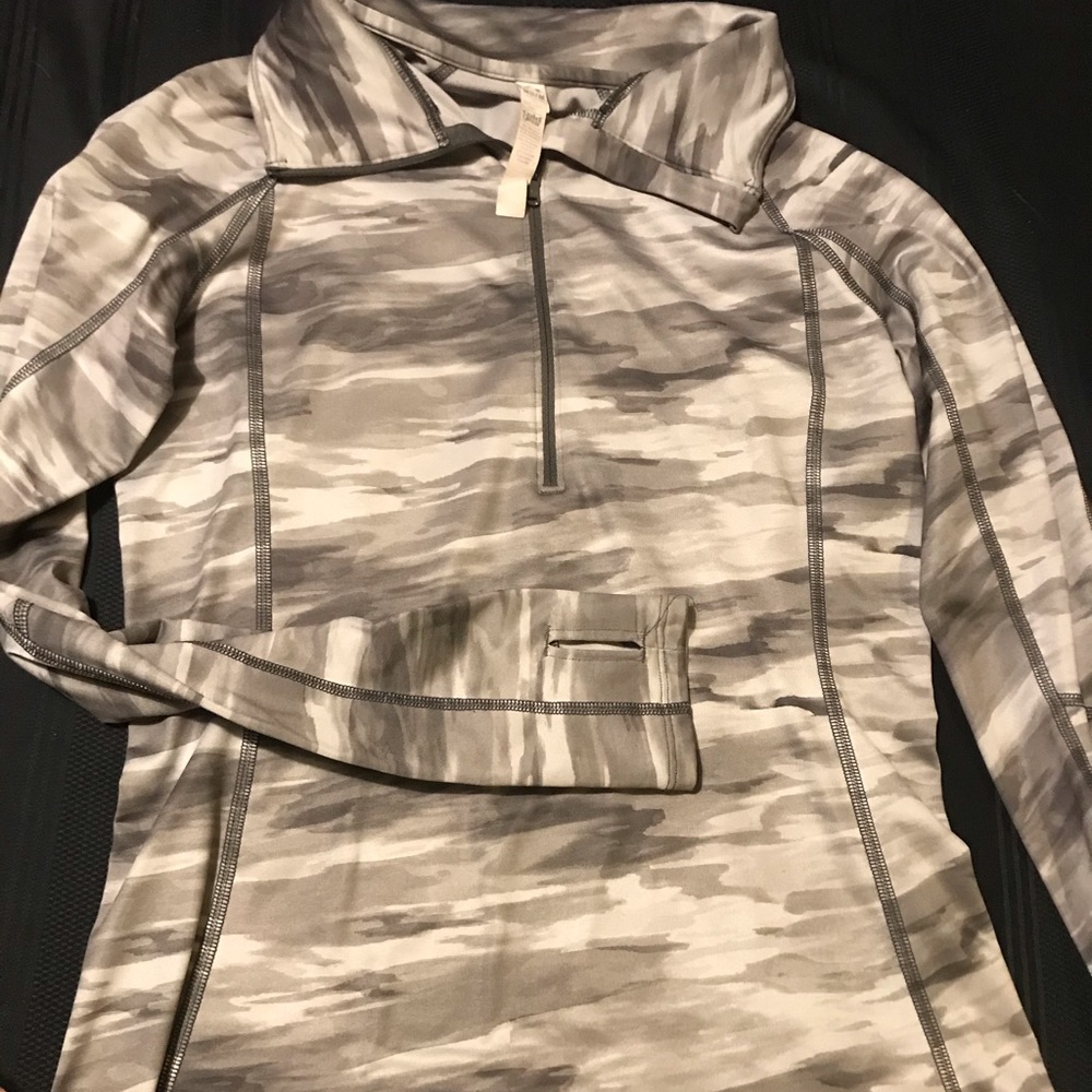 Under armor long sleeve cold gear running shirt.